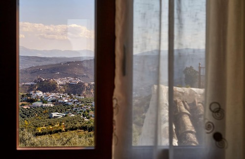 Iznajar House | Apartment with pool and spectacular views, ideal for families