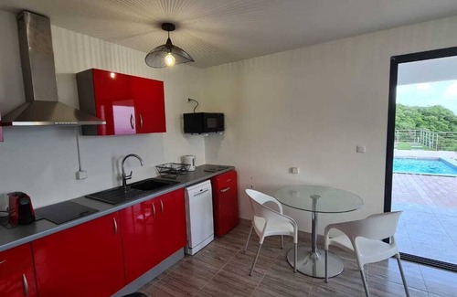 Case-Pilote Apartment | Apartment with pool and sea view