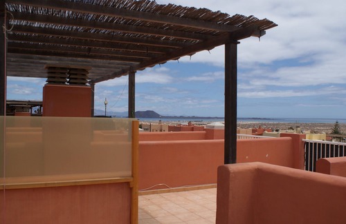 Geafond Apartment | Apartment with private roof terrace and view of Lobos Island