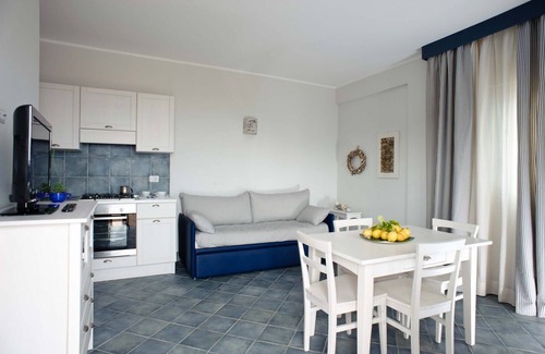 Villammare Apartment | Apartment with terrace. Shared pool. 150 metres from beach