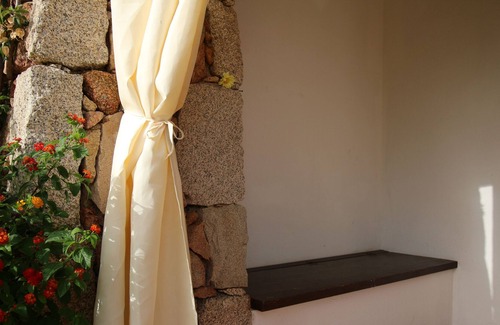 Porto San Paolo Apartment | Appartamento a Pochi Passi dal Mare con Patio e Giardino Privato