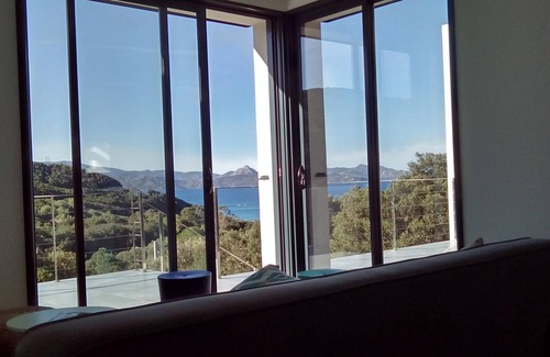 Farinole House | Architect-designed house, 50 meters from a white sandy beach, splendid sea view
