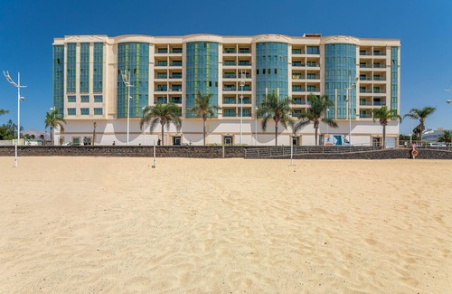 Arrecife Apartment | Arrecife Sands Apartment, op steenworp afstand van zandstrand, uitzicht op zee