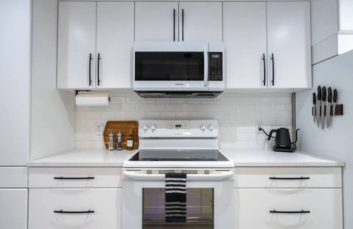Northeast Edmonton Apartment | Art, comfort, and fun just 15 minutes to downtown and steps from shops