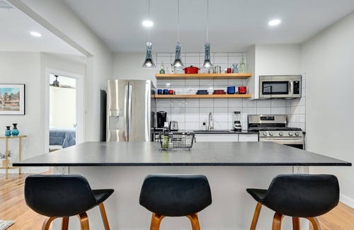 Highland House | Artful Urban Bungalow: Stylish Comfort in North Austin