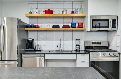 Highland House | Artful Urban Bungalow: Stylish Comfort in North Austin