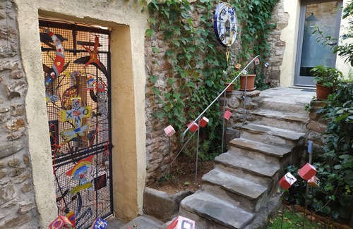 Scarlino Apartment | Artist's House Plus, sea view garden and original artwork.