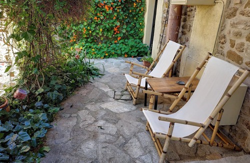 Scarlino Apartment | Artist's House Plus, sea view garden and original artwork.