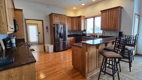 McHenry Villa | At The Top- beautiful 4 bedroom townhouse with hot tub, games and lake views!