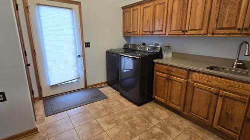 McHenry Villa | At The Top- beautiful 4 bedroom townhouse with hot tub, games and lake views!