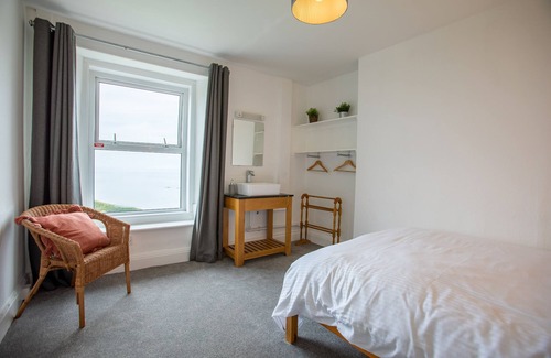 Widemouth Bay Cottage | ATLANTIC COURT, pet friendly, with a garden in Widemouth Bay