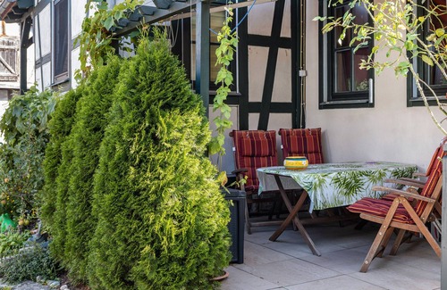 Dreißigacker Apartment | Attic Apartment in Country House Style