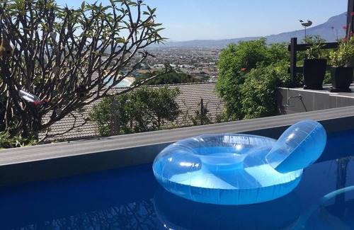 Mountainside Apartment | Attractive beach style apartment with garden