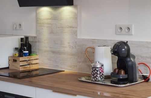 Millau Apartment | Attractive T3 refurbished in an old stone house.
