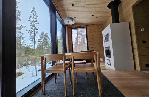 Inari Villa | Aurora welcome newly built riverside cottage