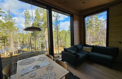 Inari Villa | Aurora welcome newly built riverside cottage