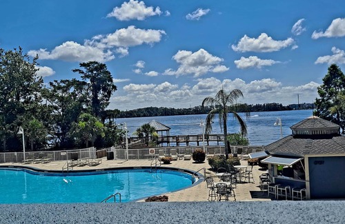 Florida Central Atlantic Coast Condo | AVAILABLE OCT 1-6; 21-25 2.5 BDR 2 BTH 25 FT LAKE VIEW BALCONY & DISNEY FIREWORK