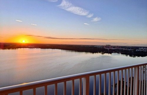 Florida Central Atlantic Coast Condo | AVAILABLE OCT 1-6; 21-25 2.5 BDR 2 BTH 25 FT LAKE VIEW BALCONY & DISNEY FIREWORK