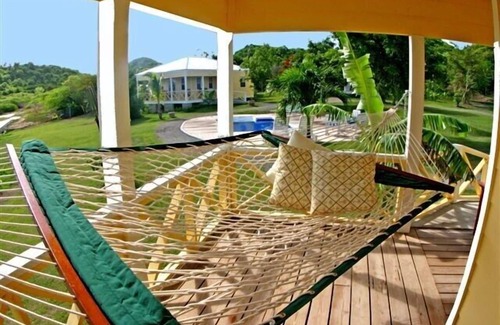 St. John's Cottage | Award-Winning, Charming Cottage in a 6-minute walk from a white sand beach.