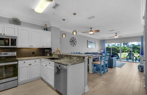 Frangista Beach Condo | Awesome Ground Floor Condo, Steps From Beach, Heated Pool & Spa! Pet Friendly!