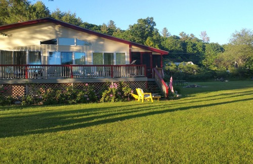 Bryant Pond House | Awesome unique home right on the lake with huge yard, hot tub near Sunday river