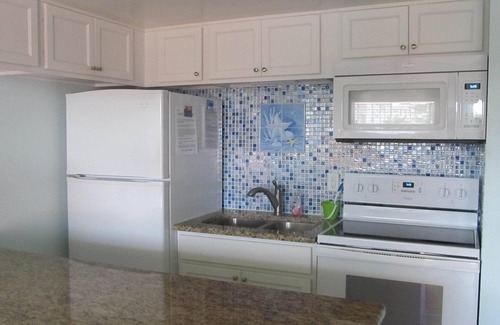 Sunset Beach Condo | Awesome view of the Bay. Pool , Quiet beach neighborhood