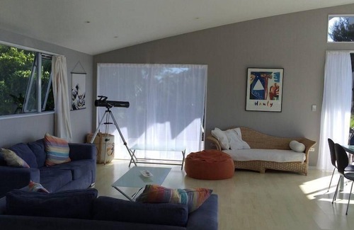 Mangawhai House | Azabu - Modern holiday home with extensive estuary views and walkway estuary access