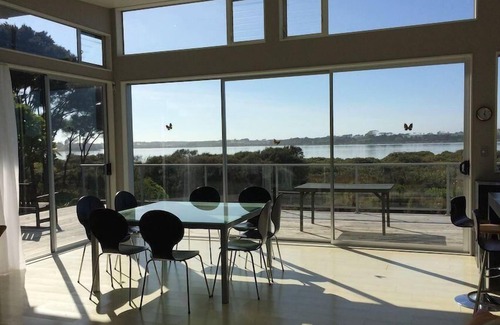 Mangawhai House | Azabu - Modern holiday home with extensive estuary views and walkway estuary access