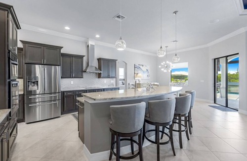 Pelican House | Azure Escape| 3/3 Canal Front Pool Home With A Spa