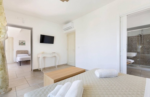 Pittuini House | B&B I Tarocchi - Suite La Forza