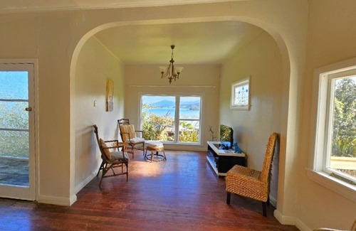 Rawene House | Bach with beautiful harbour views in historic Rawene village.