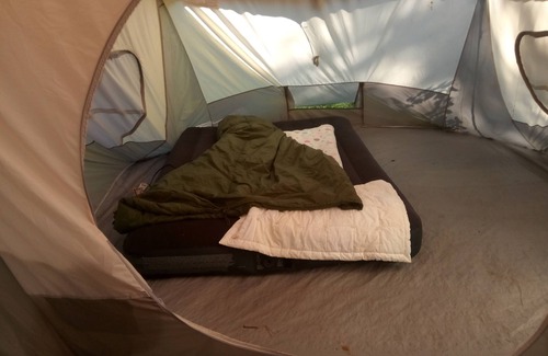Kenosha Apartment | Backyard Tent Wakling distance to the beach