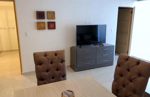 El Tezal Apartment | Bahia del Tezal 103b, 1BR Modern condo big rooftop pool walk to beach through Riu hotel