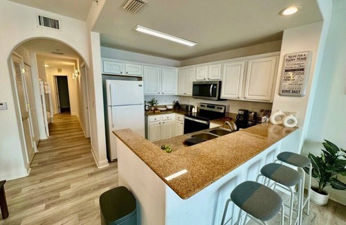 Florida Central Atlantic Coast Apartment | Balcony King Suite - Lake & Pool view