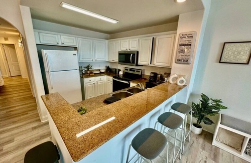 Florida Central Atlantic Coast Apartment | Balcony King Suite - Lake & Pool view