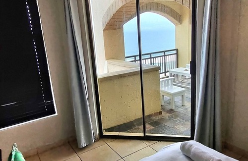Umhlali Apartment | Bali Hai Beach and Sea Views. Beachfront infinity pool overlooking the ocean.