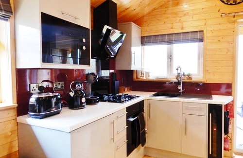 Welsh Frankton Cabin | Balmoral Studio Lodge 2 Birth Log Cabin With Lake Views & Private Hot Tub