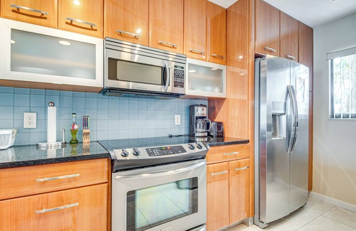 Cocoa Isles Condo | Bay-View Cocoa Beach Condo w/Heated Pool!