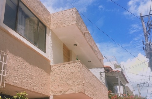 Manga Apartment | Bayfront home with fantastic views, full kitchen and quality wifi