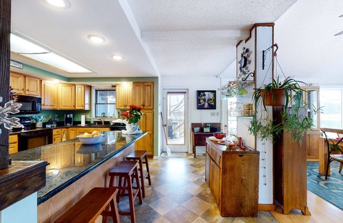 Ocean Pines House | Bayfront Home on Deep Water with dock, bay-view deck, WiFi & community pools