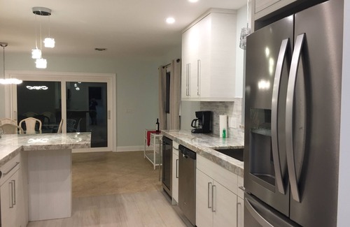 Whitney Beach House | Bayfront Longboat Key House with Pool and 3 min walk to the beach