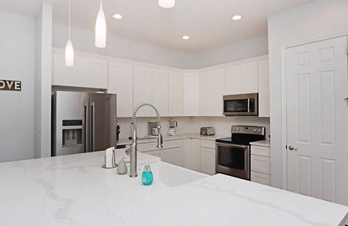 Sun Ridge House | Bayside Resort house w/tennis court, pool, private gas grill, and fireplace