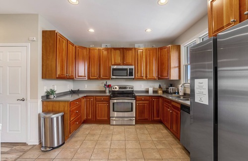 Sun Ridge House | Bayside Resort townhome with WiFi, balconies, fireplace, onsite pools, & hot tub