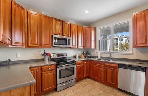 Sun Ridge House | Bayside Resort townhome with WiFi, balconies, fireplace, onsite pools, & hot tub