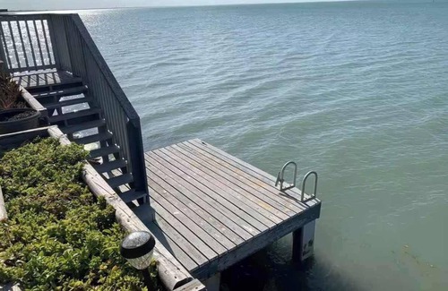 Port Isabel House | Bayside Waterfront Home with Patio & Games Room