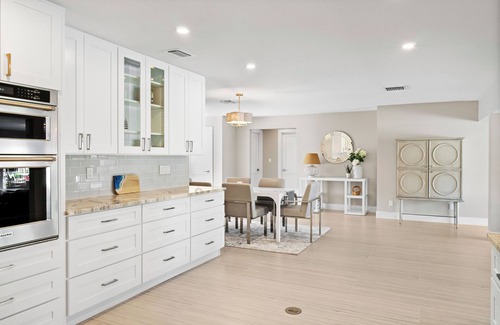 Whitney Beach House | Beach Bungalow: Pet Friendly, Best Canal, Dock, Beach, Pool. Renovated in 2025