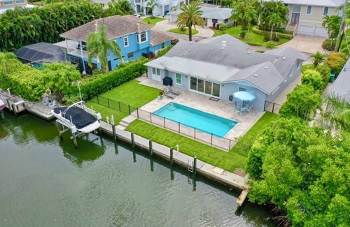 Whitney Beach House | Beach Bungalow: Pet Friendly, Best Canal, Dock, Beach, Pool. Renovated in 2025
