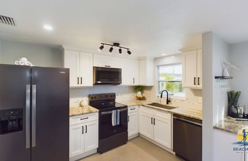 Holmes Beach Cottage | Beach Cottage! Beautiful Pool/Spa, Steps to sand, Fun Golf Cart.