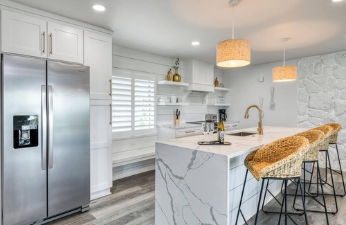 Butler Beach House | Beach Escape | Oceanfront Beach House with Pool, Mini Golf, Beach Access + Pickl