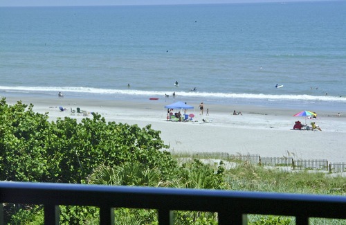 Port Canaveral Condo | BEACH FRONT TOP FLOOR w/Private Balcony - Master Bedroom & Living Room on Ocean